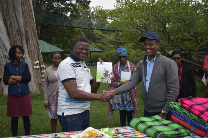 Josea Josea Sagbo, Director of Nature Tropicale, receives his copy