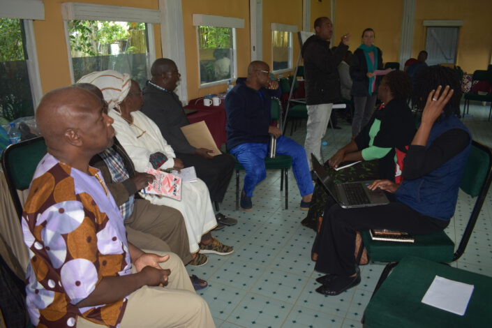 Secretariat and Board doing group work